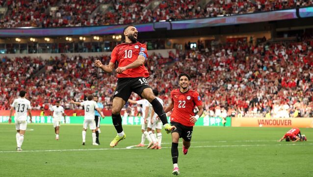 <p>MAGIC MO-MENT: Mohamed Salah celebrates scoring his team's second goal. Pic: Fran Santiago/Getty Images.</p>