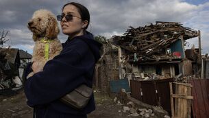 <p>Alisa and her dog Barney walking by a destroyed house hit by missiles overnight on June 15, 2026, in Kyiv: Ireland pledges 'unwavering support' for Ukraine during its presidency. Picture: Paula Bronstein/Getty Images</p> <p>Alisa and her dog Barney walking by a destroyed house hit by missiles overnight on June 15, 2026, in Kyiv: Ireland pledges 'unwavering support' for Ukraine during its presidency. Picture: Paula Bronstein/Getty Images</p>