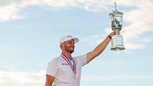 <p>Wyndham Clark poses with the U.S. Open Championship Trophy at Shinnecock Hills. “Anytime someone said something negative to me, I replaced it with something positive,” Clark said.</p>