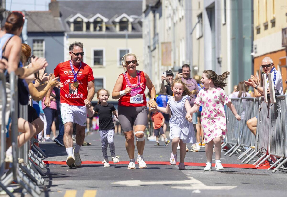 Pictured at the WLR Waterford Viking Marathon 2026 are brother and sister Martin Carroll and Alma Carroll nearing the finish where they were joined by Eve, Holly and Ava carroll. Photograph: Patrick Browne