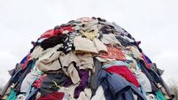 textile pollution, fast fashion industry waste, old clothing cloth fabric garment trash garbage pile stack heap  background, con