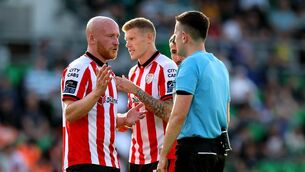 <p>LUCKY MCCLEAN?: Derry’s Liam Boyce and James McClean with Referee Aaron O’Dowd. Pic: ©INPHO/Ryan Byrne.</p> <p>LUCKY MCCLEAN?: Derry’s Liam Boyce and James McClean with Referee Aaron O’Dowd. Pic: ©INPHO/Ryan Byrne.</p>