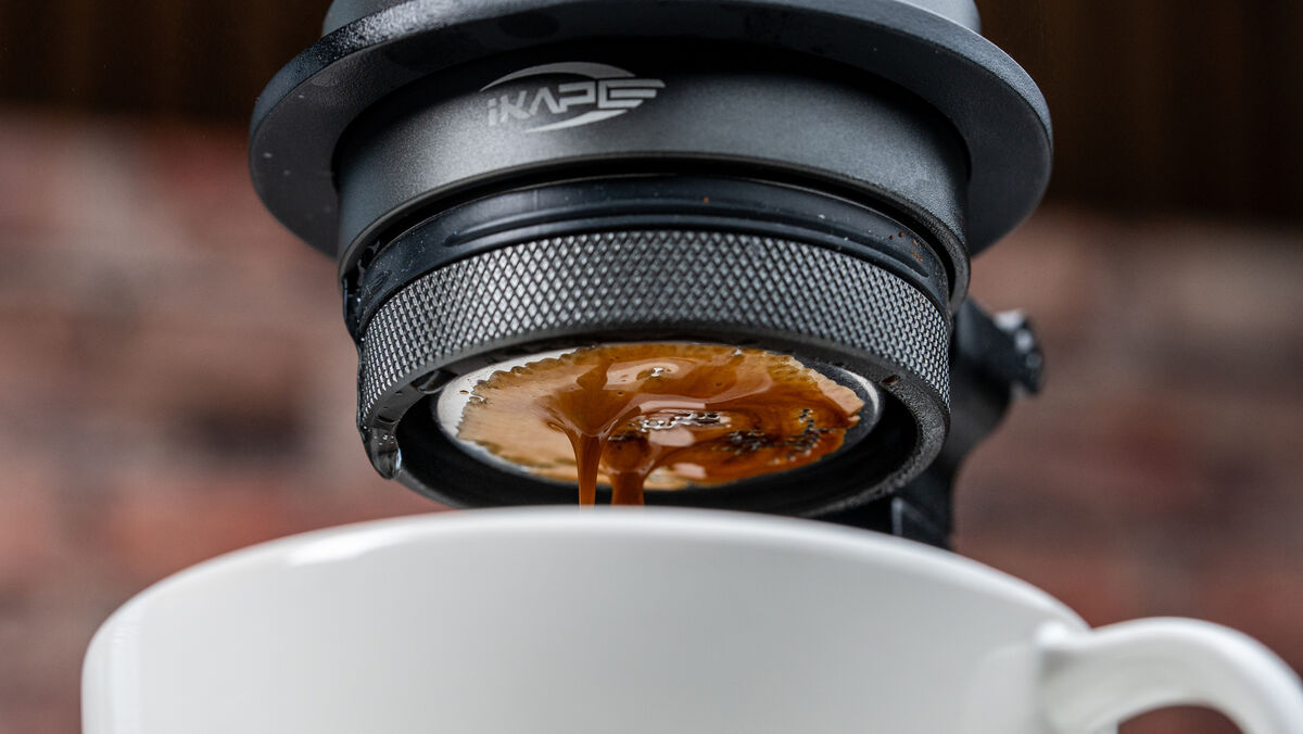 Self-heating technology eliminates the need for a separate heat source, allowing the Kaapo K2 to brew rich espresso using either hot or cold water. Picture: Noel Campion