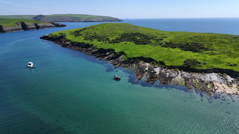 Summer sunshine at Sandycove, Kinsale, Co Cork,  as people enjoy time at the beach and on the water. Picture: Larry Cummins