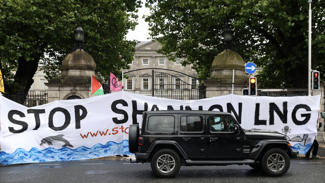 <p>Climate activists from the Stop Shannon LNG Coalition protesting outside Leinster House in July 2025 over government plans to establish liquefied natural gas (LNG) infrastructure in Ireland. File picture: Sasko Lazarov/RollingNews.ie</p>