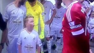 WATCH: This mascot couldn’t quite believe he was standing next to Wayne Rooney