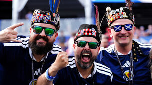 <p>Scotland fans ahead of the FIFA World Cup Group C match at the Boston Stadium.</p>