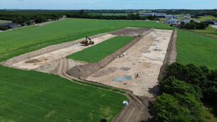 An aerial shot shows an archaeological site in Soften near Aarhus (James Brooks/AP)