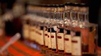 Vintage whiskey bottles in a row