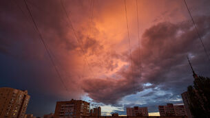Sunset lights the sky over a Moscow district in Moscow, Russia (Alexander Zemlianichenko/AP) Sunset lights the sky over a Moscow district in Moscow, Russia (Alexander Zemlianichenko/AP)