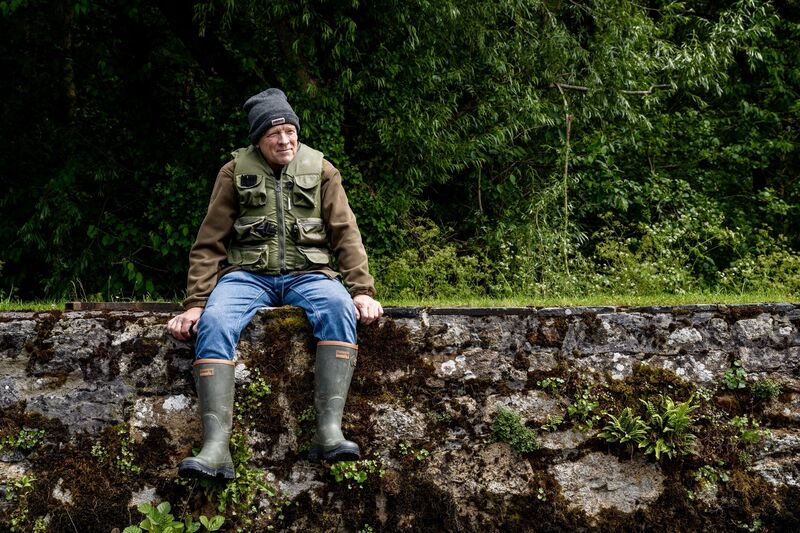 Lifelong angler John on the banks of the River Barrow. Picture: Chani Anderson