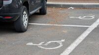 Double parking on Handicapped parking spots
