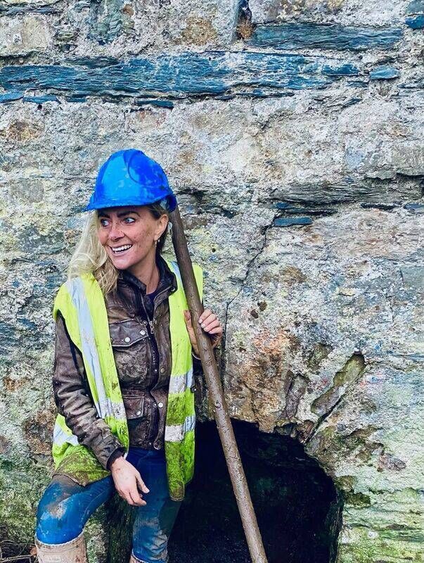 Charlotte Cargin working on the restoration of a well in Kinsale. “We did it!!! We saved this well and old tower from demolition! The tower was for sale as a "development" site with permission for its demolition”. Charlotte Cargin working on the restoration of a well in Kinsale. “We did it!!! We saved this well and old tower from demolition! The tower was for sale as a "development" site with permission for its demolition”.