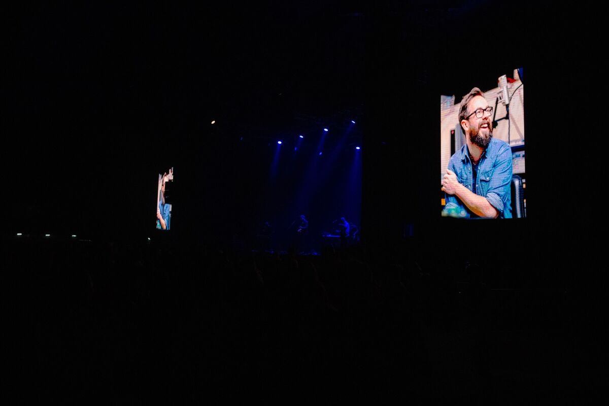 A photograph of the late Glenn Keating, friend and collaborator of Bell X1, is displayed on the big screens during the band’s concert. Picture: Chani Anderson A photograph of the late Glenn Keating, friend and collaborator of Bell X1, is displayed on the big screens during the band’s concert. Picture: Chani Anderson