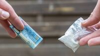 Drug dealer sells drugs for cash