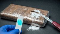 Positive cocaine test result in seized drug package from police trafficking operation.
