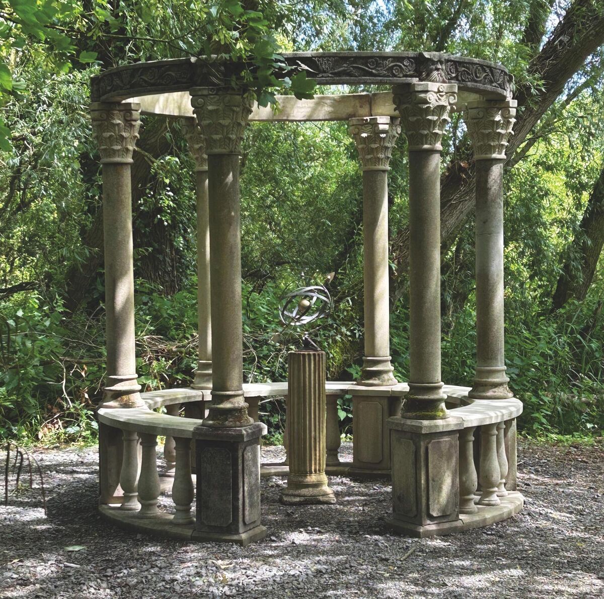 The circular stone pavilion or temple.