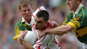 <p>Ryan McMenamin, Tyrone, under pressure from Dara O'Cinneide and Liam Hassett in the 2005 decider. Pic: Damien Eagers/ SPORTSFILE </p>