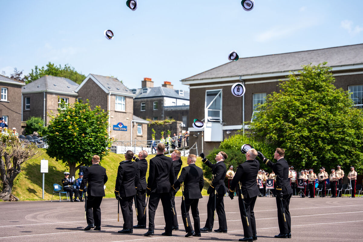 Naval graduates throw their hats in the air at the naval graduation ceremony. Picture: Noel Sweeney Naval graduates throw their hats in the air at the naval graduation ceremony. Picture: Noel Sweeney