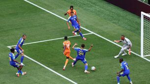 <p>Nicolas Pepe slides in the opener from close range to give Ivory Coast the lead. Picture: Dan Mullan/Getty</p>