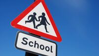 School children crossing sign with copy space