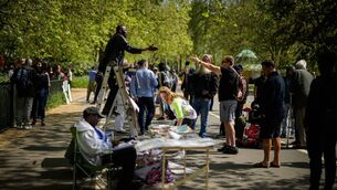 <p>A man holds a heated debate with a member of his audience at Speakers' Corner in Hyde Park, London. File Picture: Leon Neal/Getty </p>