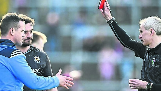 <p>SEEING RED: Referee Fergal Kelly shows a red card to Ger Brennan and to Cian Breathnach-McGinn. Pic: Sportsfile</p>