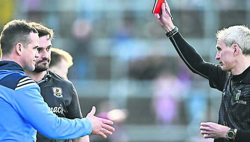 SEEING RED: Referee Fergal Kelly shows a red card to Ger Brennan and to Cian Breathnach-McGinn. Pic: Sportsfile