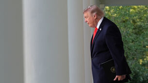 President Donald Trump walks from the Oval Office (Jacquelyn Martin/PA)