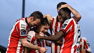 <p>Adam O'Reilly of Derry City celebrates with teammates, from left, Cameron Dummigan, Patrick McClean and James Olayinka during their side's victory over Drogheda. Pic: Ramsey Cardy/Sportsfile</p>