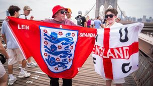 <p>England fans Peter Harding, 74, (left) and Len Pyle, 14, pose after speaking to the Press Association on Brooklyn Bridge. Picture: James Manning/PA Wire.</p>