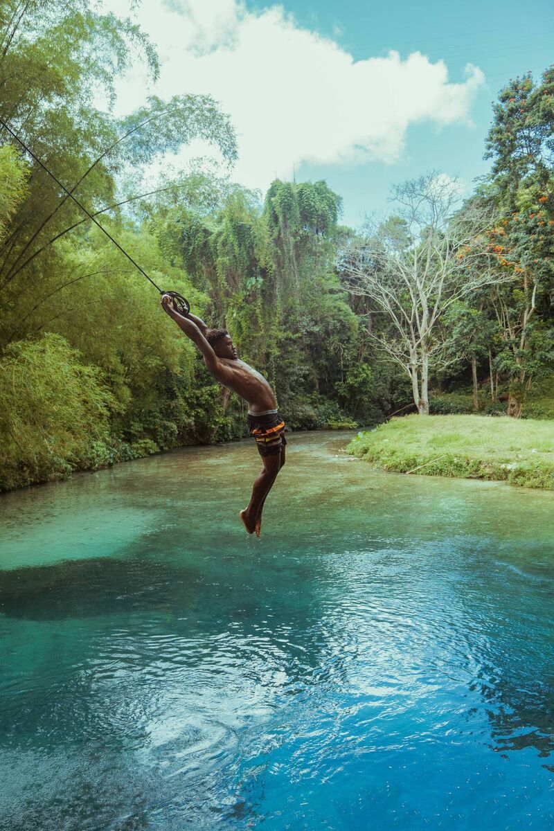 A rope swing at Spanish Bridge at Ocho Rios A rope swing at Spanish Bridge at Ocho Rios