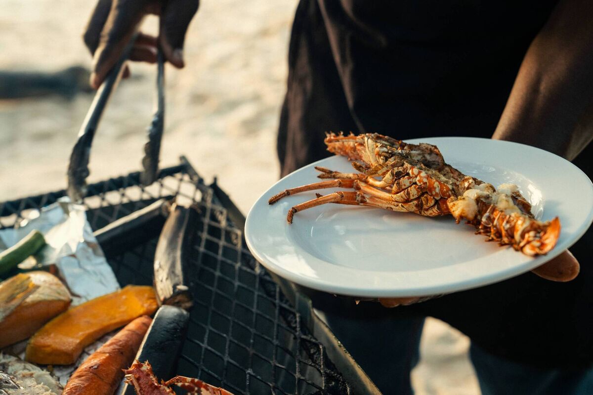 Local lobster on the grill at Ocho Rios Local lobster on the grill at Ocho Rios