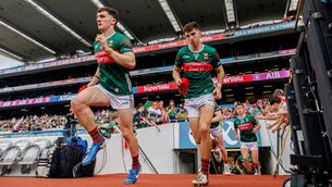 <p>Mayo's Jack Coyne and Enda Hession step out onto the Croke Park pitch ahead of the All-Ireland SFC quarter-final against Cork. Pic: ©INPHO/James Crombie</p>