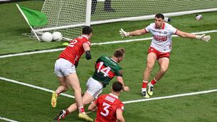 <p>Ryan O Donoghue of Mayo goes down under the challenge of Maurice Shanley of Cork during the GAA Football All-Ireland Senior Championship quarter-final match between Cork and Mayo at Croke Park in Dublin. Photo by Sam Barnes/Sportsfile</p>