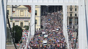 Participants cross the Elizabeth Bridge during the 31st Budapest Pride event (Zoltan Balogh/MTI via AP)