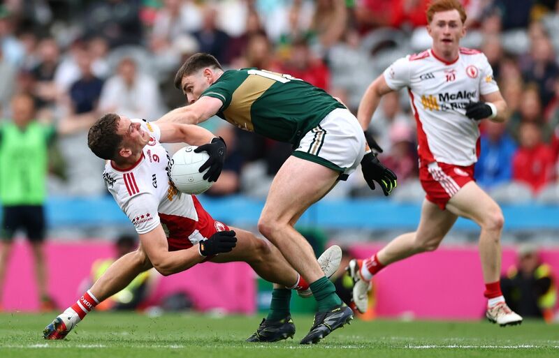 Tyrone’s Conn Kilpatrick and Diarmuid O’Connor of Kerry. Pic ©INPHO/James Crombie