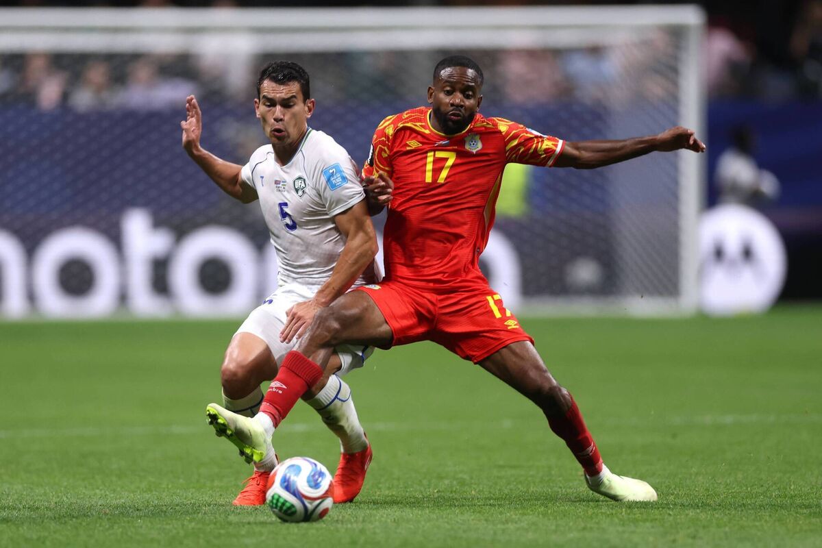 Rustam Ashurmatov competes for the ball against Cedric Bakambu of Congo DR. Picture: Lars Baron/Getty