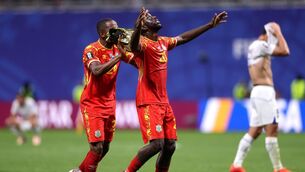 <p>HEAVEN SENT: Yoane Wissa points to the heavens in delight at the final whistle. Picture: Lars Baron/Getty</p>
