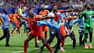 <p>HISTORY MAKERS: Congo DR players celebrate with supporters after securing a place in the knockout stages. Picture: Molly Darlington/Getty</p>