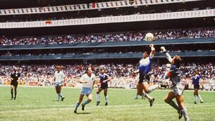 <p>Argentina’s Diego Maradona handles the ball past England’s Peter Shilton to score the opening goal of the World Cup quarter-final at the Azteca Stadium in Mexico City on June 22, 1986; Argentina won 2-1. Picture: Bongarts</p>