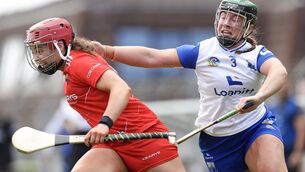 <p>Cork’s Sorcha McCartan and Waterford’s Laoise Forrest. Pic: ©INPHO/Stephen Heaney.</p>