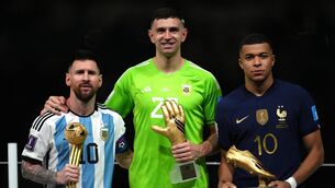 <p>SETTING THE PACE: Argentina's Lionel Messi, golden ball, goalkeeper Emiliano Martinez, golden glove, and France's Kylian Mbappe, golden boot after the 2022 World Cup final. Pic: Nick Potts/PA Wire.</p>