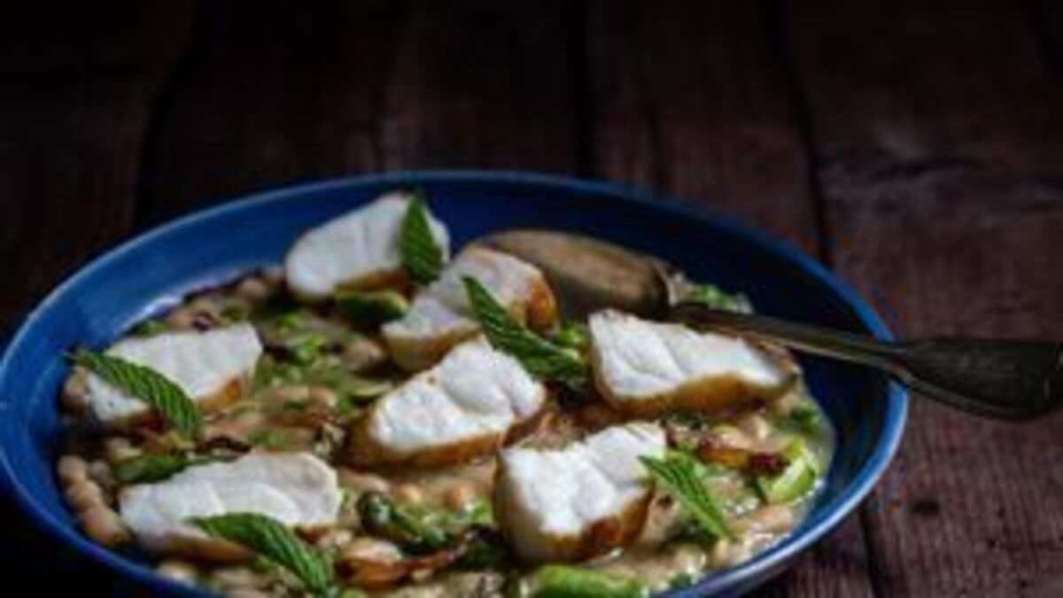 Monkfish with haricot bean, pea and guanciale stew