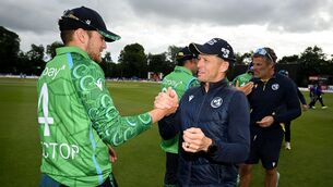 <p>Ireland head coach Heinrich Malan and Tim Tector celebrate after Sunday's match two in Belfast. Pic: Ramsey Cardy/Sportsfile</p>