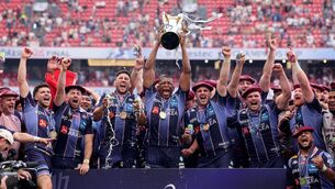 <p>Union Bordeaux Bègles' Cameron Woki celebrates with the Champions Cup Trophy. Pic: ©INPHO/James Crombie</p>