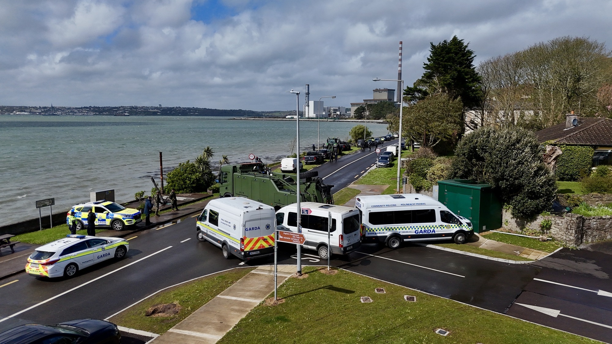 An army heavy-lift recovery truck and garda vans are used to block the main road into Whitegate, Co Cork, in April. The foreign affairs minister is anxious to avoid such scenes during Ireland's presidency of the EU. Picture: Larry Cummins