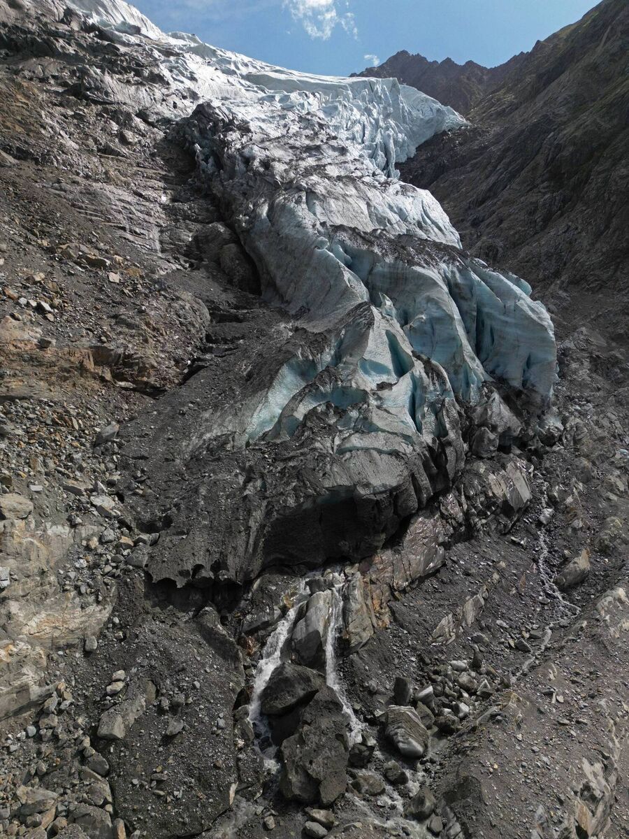 Meltwater streams down from the snout of the receding Taconnaz glacier near Chamonix-Mont-Blanc, France. on Sunday. Picture: Sean Gallup/Getty Images