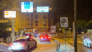 Police stop motorists after a blast from an explosive device (Clement Lanot via AP)