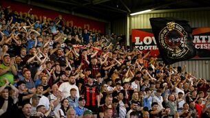 <p>THEN THERE WERE TWO: Bohemians supporters celebrate after their side's win. Pic: Mark Kavanagh/Sportsfile.</p> <p>THEN THERE WERE TWO: Bohemians supporters celebrate after their side's win. Pic: Mark Kavanagh/Sportsfile.</p>